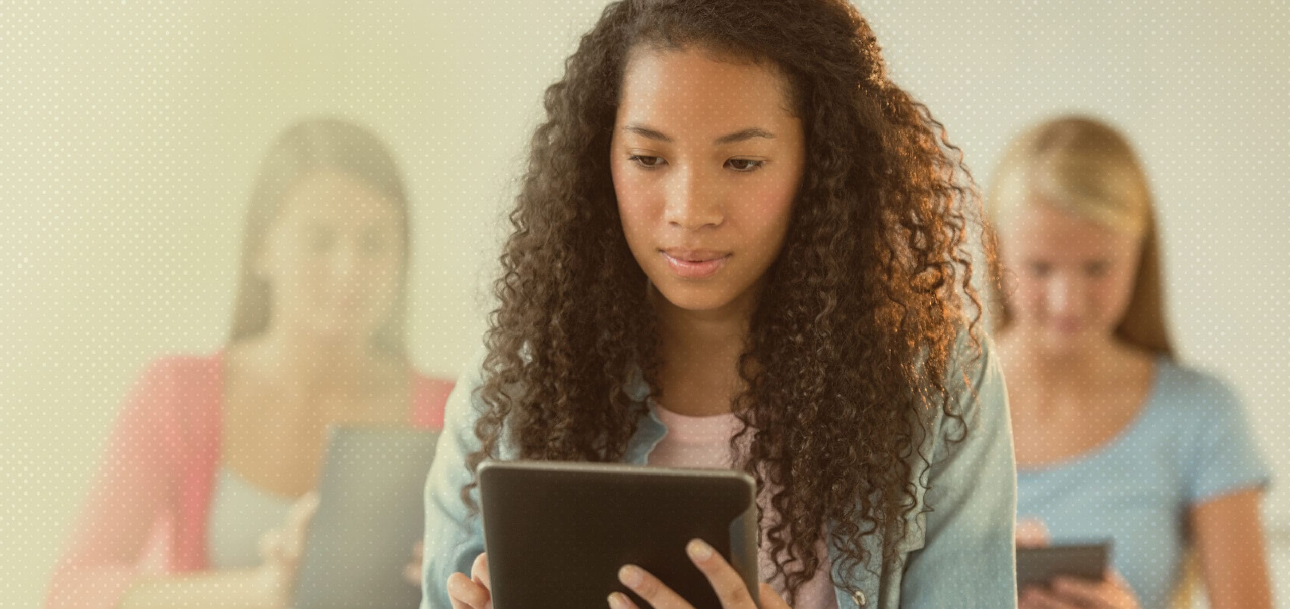 Student taking an online class on an tablet