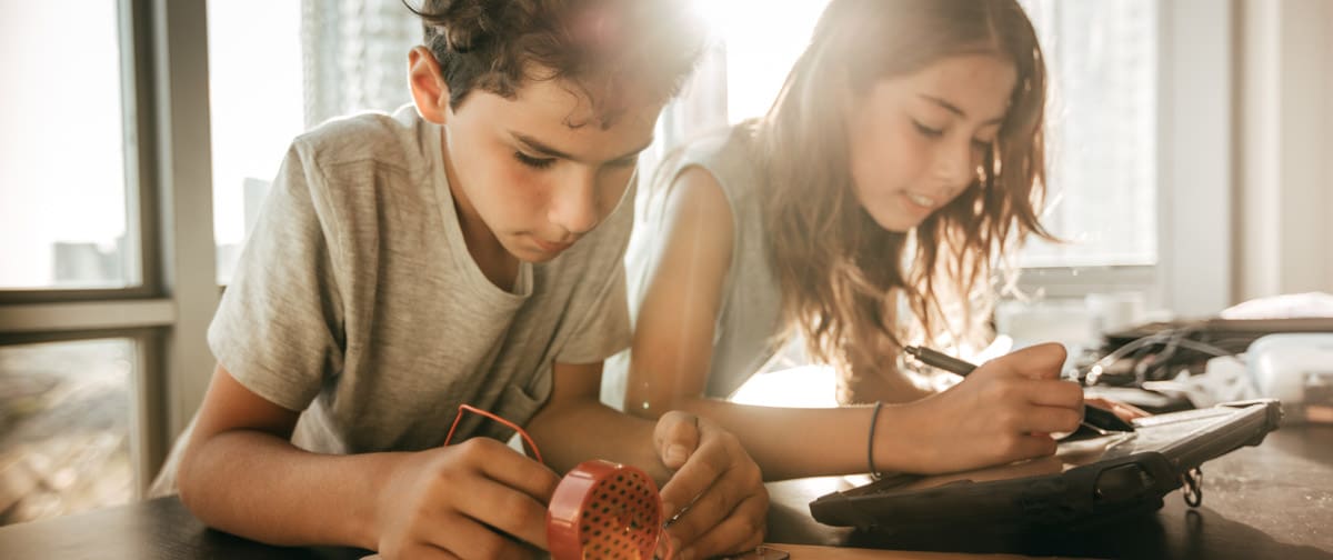 Pre-teens building new robotic system