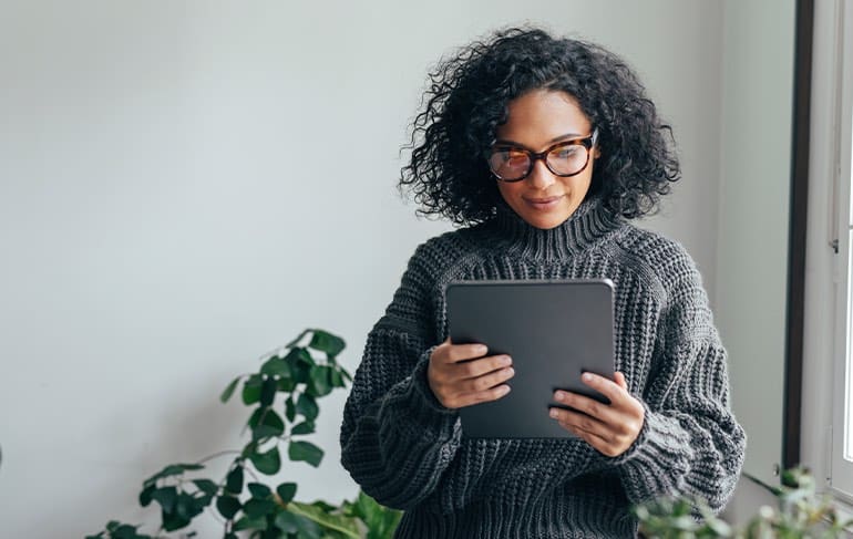 Woman looking at tablet