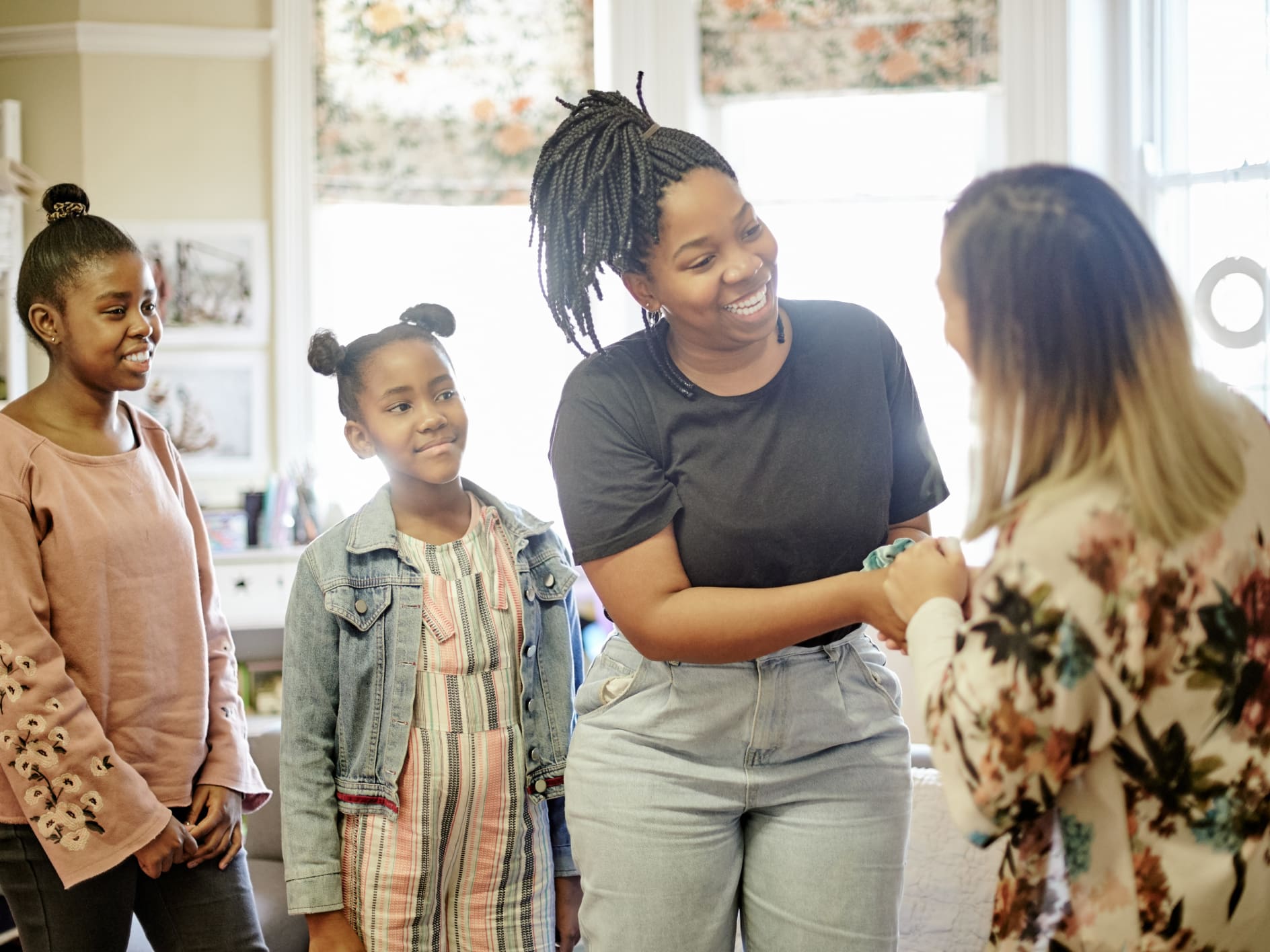 Parent and students meeting teacher