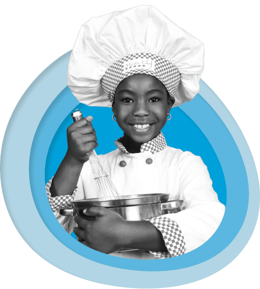 Elementary student mixing food in a bowl