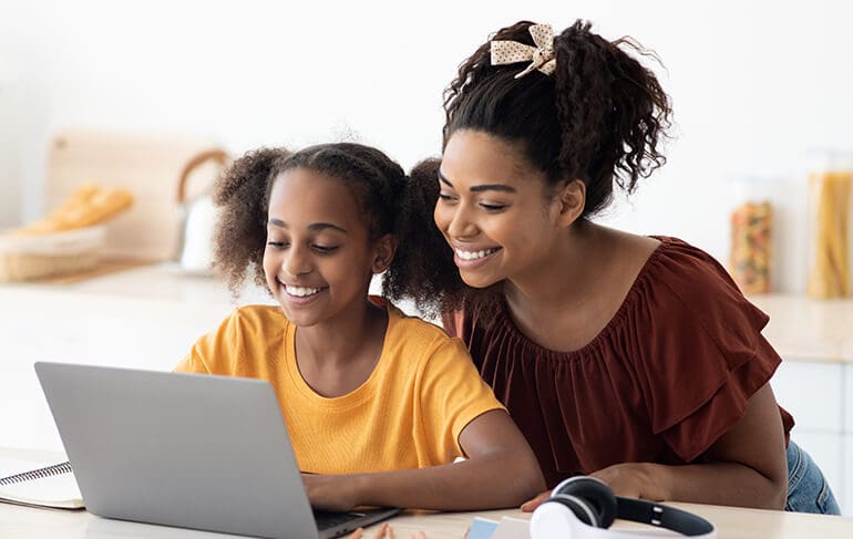 Mother and daughter learning online