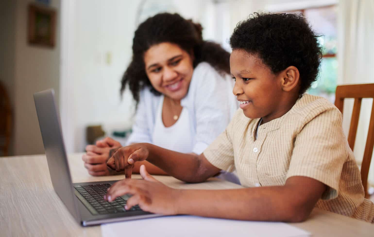 Student and parent learning from home