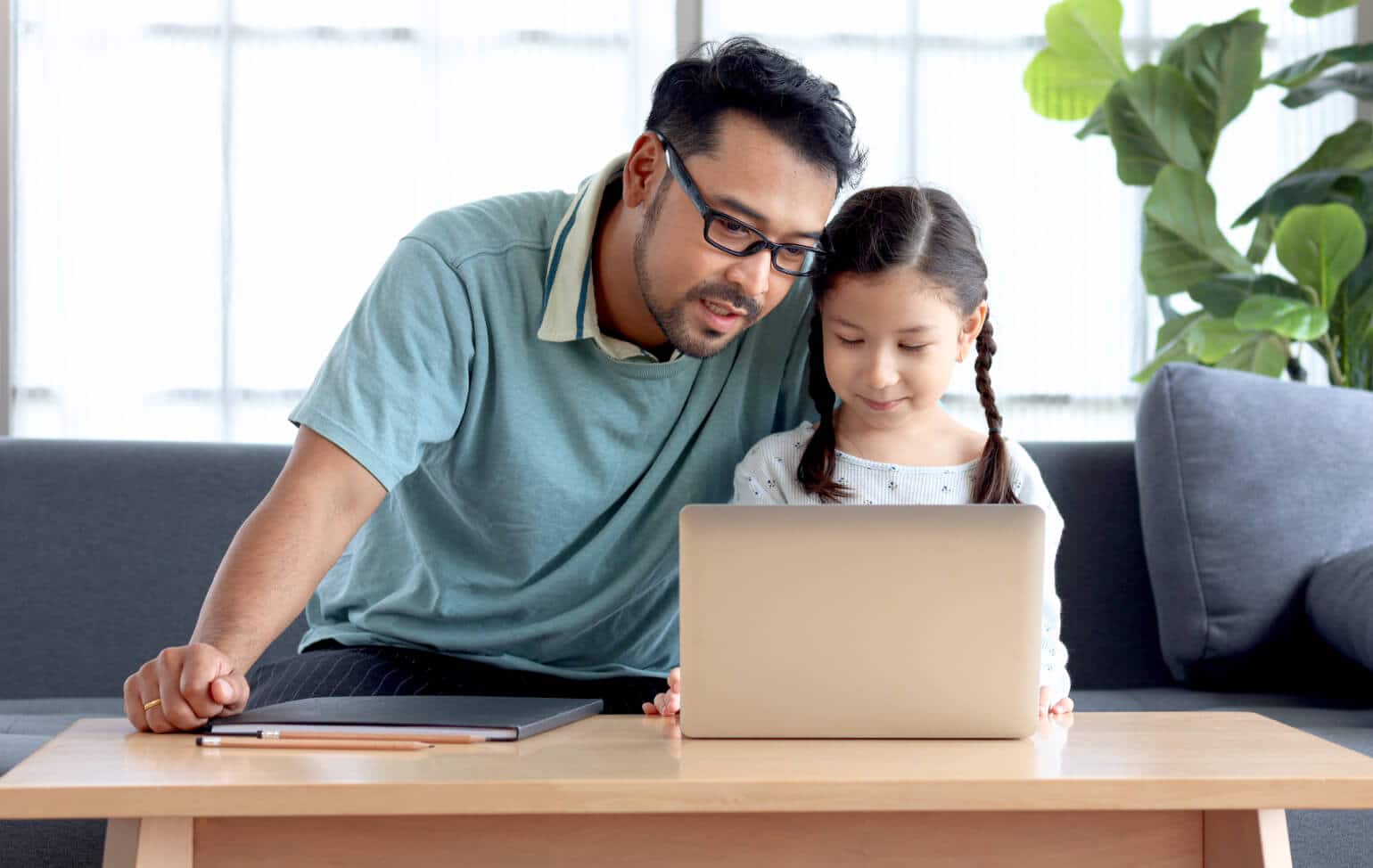 Student and parent learning from home