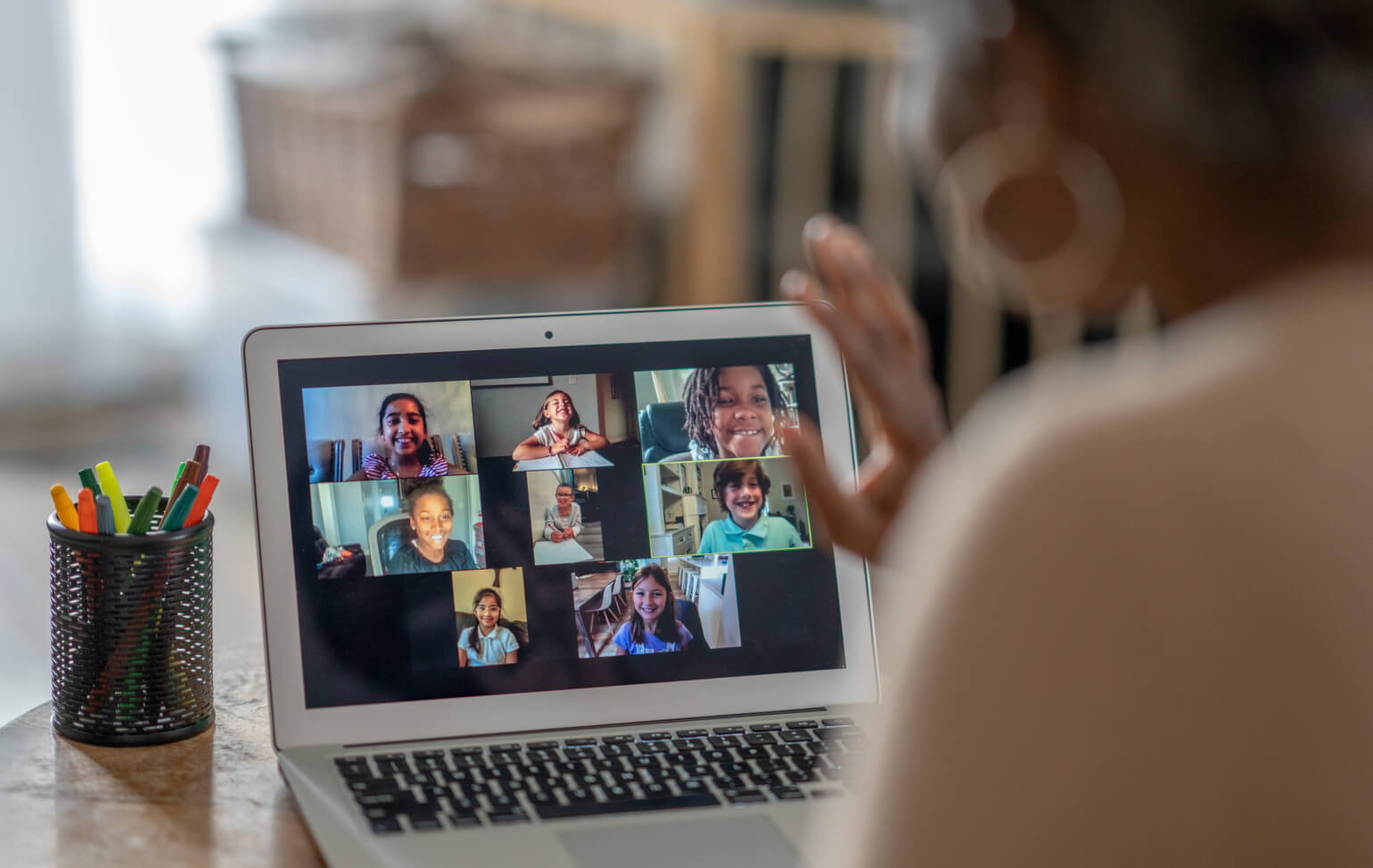 Students in a virtual live lesson with a teacher