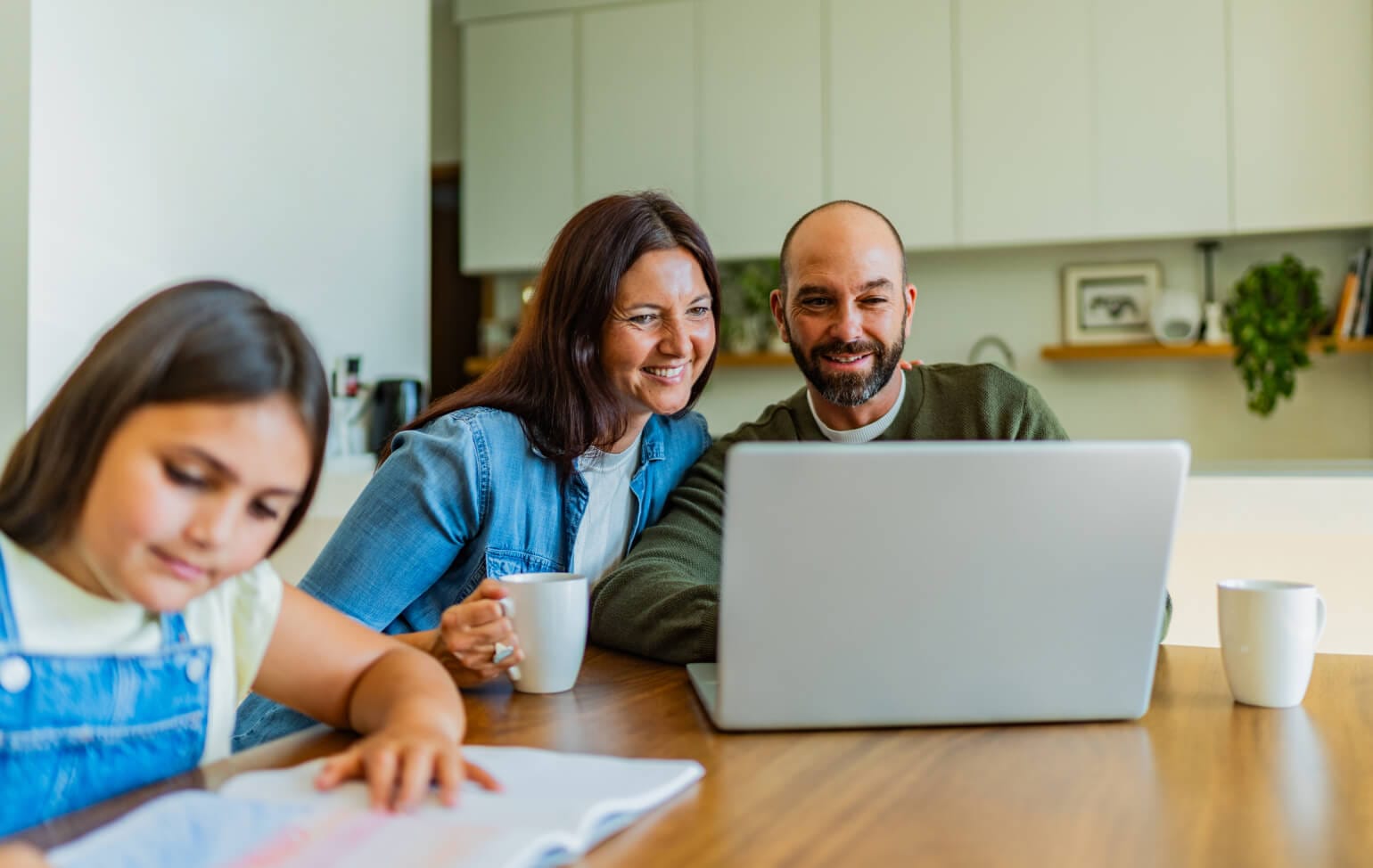 Student and parents working online